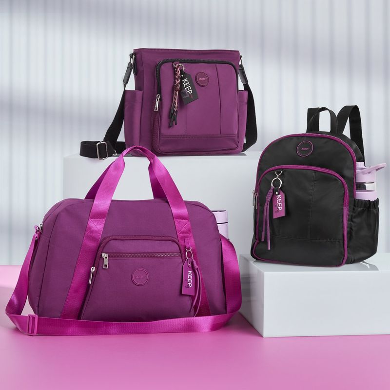 Morral-para-mujer-de-estilo-casual-de-color-morado-en-tela-poliester-con-asa-larga-regulable.